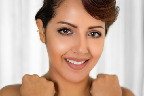 Beautiful,Smiling,Middle,Eastern,Woman - The Ins and Outs of Gum Lightening Gum Specialist in Los Angeles